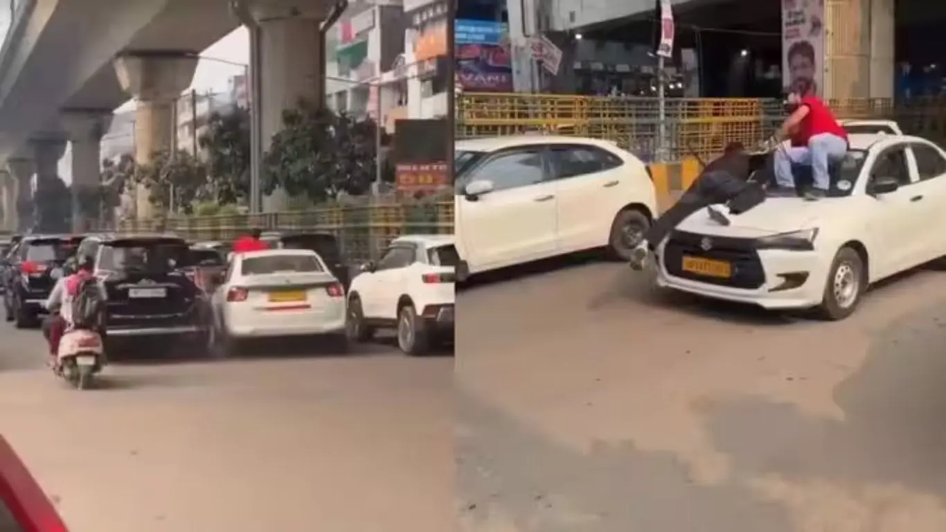 Youths hanging onto the bonnet of a moving car in Noida Sector 18